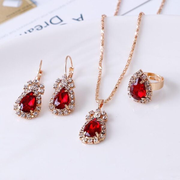 Factory source European and American cross-border explosions water drop heart-shaped jewelry three-piece necklace earrings ring diamond pendant